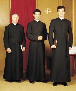 Catholic priests wearing cassocks.